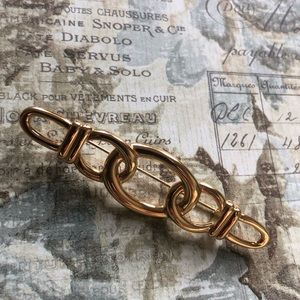 Monet golden brooch
